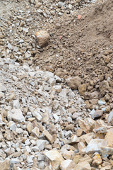 pile of rock and stone with soil
