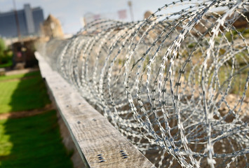 Protected area with barbed wire fence  Israel.