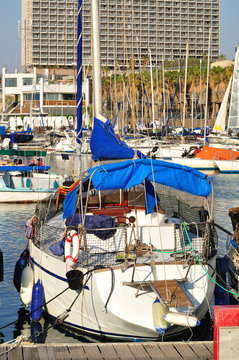 Small yacht at the marina of Tel Aviv seashore.