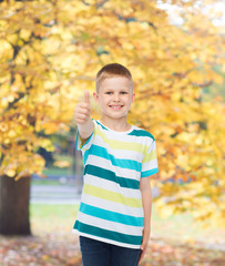little boy in casual clothes with arms crossed