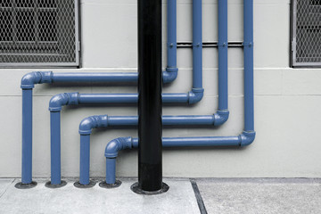 colorful of pipes under the modern building
