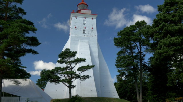 A big white lighthouse on the middle of the field GH4 4K UHD