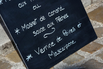 Fototapeta na wymiar Menu board outside a French restaurant