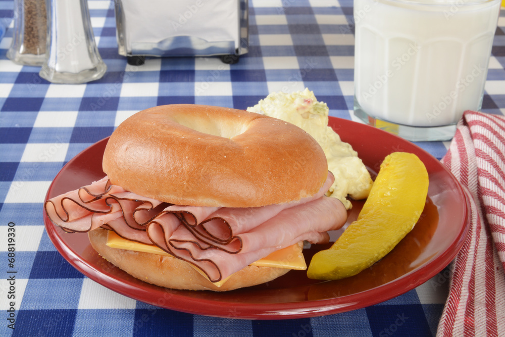 Wall mural Ham and cheese sandwich on a bagel