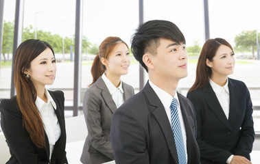 young business people sitting together in the office