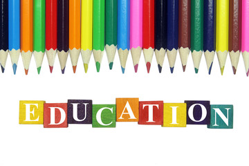 word education and colorful pencils