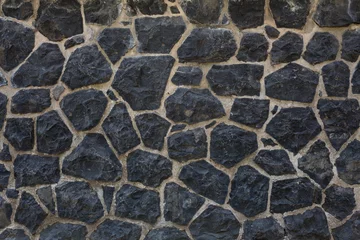 Selbstklebende Fototapete Steine Dunkler Steinmauerhintergrund