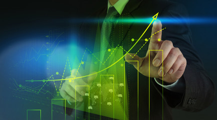 businessman hand working with new modern computer and business s