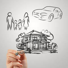 hand draws planning family future as concept