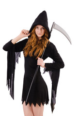 Young witch with scythe isolated on white