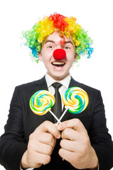 Clown with lollipop isolated on white