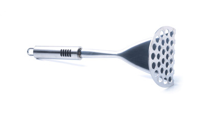 Metal potato masher on a white background.
