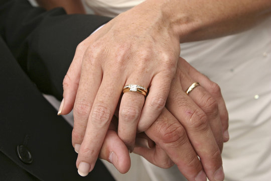 Couple showing their wedding rings