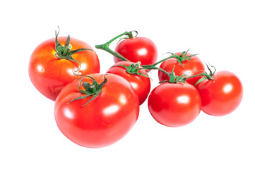 bunch of red tomatoes isolated on a white background