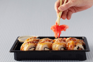 hands sticks japan rolls