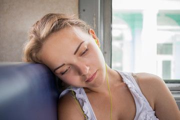 Girl listens to music of  train