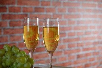 Glass of white wine on table