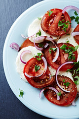 Black Tomatoes with Mozzarella and Fresh Parsley