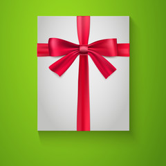 Gift wrapping with red bow and ribbon, top view