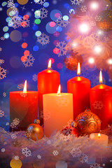 Composition with candles and Christmas decorations,