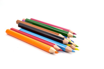 colorful pencils on white background