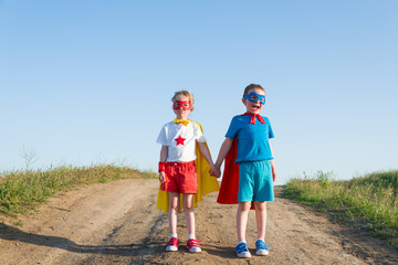 children acting like a superhero