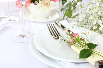 Table setting with spring flowers close up
