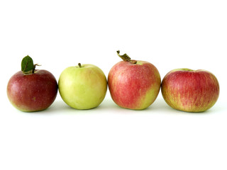 four fresh apples on white