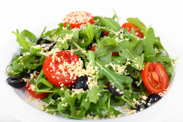 Fresh salad with arugula, close up