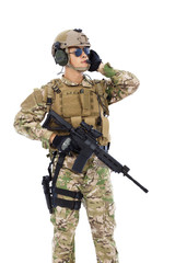 Soldier talking portable radio station. isolated on white
