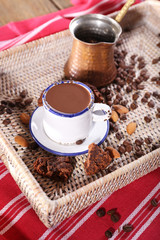 Cup of hot chocolate on table, close up