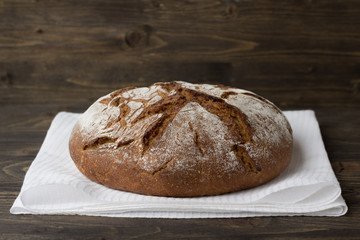 Rye bread on wooden background