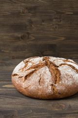 Rye bread on wooden background