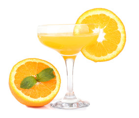 Glass of orange cocktail isolated on white