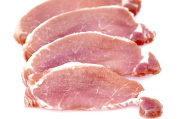Piece of raw meat cut into steaks