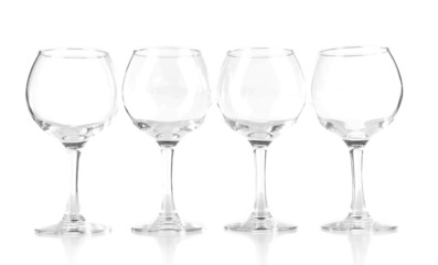 Empty wine glasses isolated on white