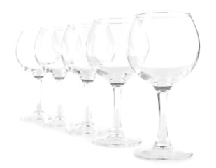 Empty wine glasses isolated on white