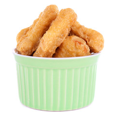 Fried chicken nuggets in bowl isolated on white