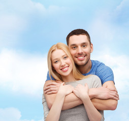 Fototapeta premium smiling couple hugging
