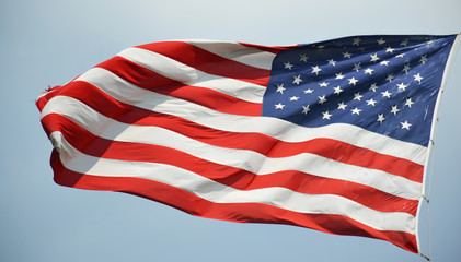 American flag waving in a sky
