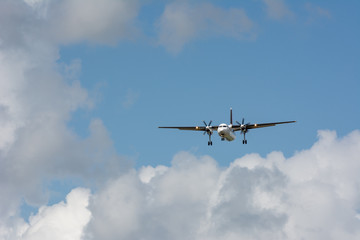 Fototapeta na wymiar unidentified plane on landing approach at amsterdam airport