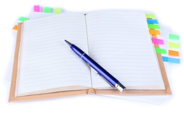 Notebook, pen, and stickers isolated on white
