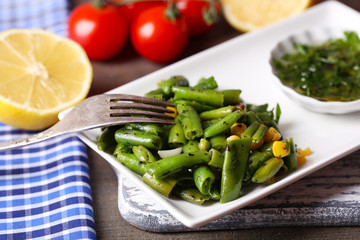 Salad with green beans and corn, and sauce