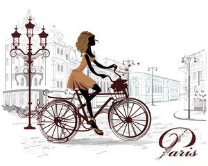 Fashion girl rides a bicycle, decorated with a musical stave - obrazy, fototapety, plakaty