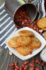 Cheese and crackers on wooden table close-up