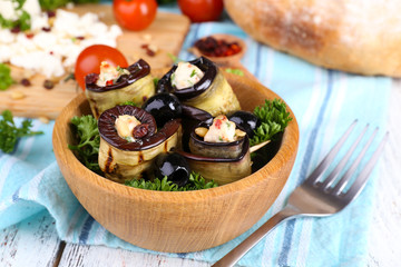 Fried aubergine in a bowl with cottage cheese, bread and