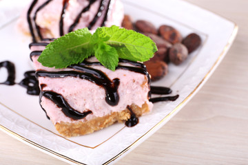 Cake with fresh mint and chocolate glaze