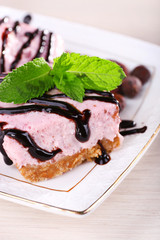 Cake with fresh mint and chocolate glaze