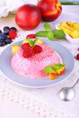 Round shaped cake with fruits and berries