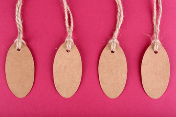 Brown tags on colorful background